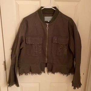 Green bomber jacket with flowy sleeves